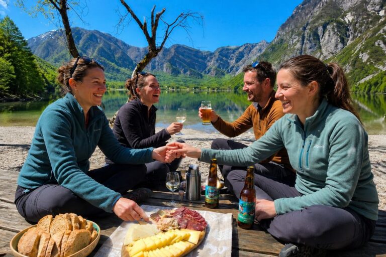 Local picnic Local picnic with travellers enjoying Slovenian food in the Bohinj area