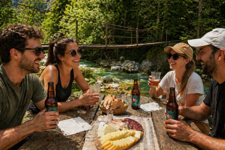 Local Slovenian Picnic Travellers enjoying a local picnic with beer and snacks in the Soča Valley