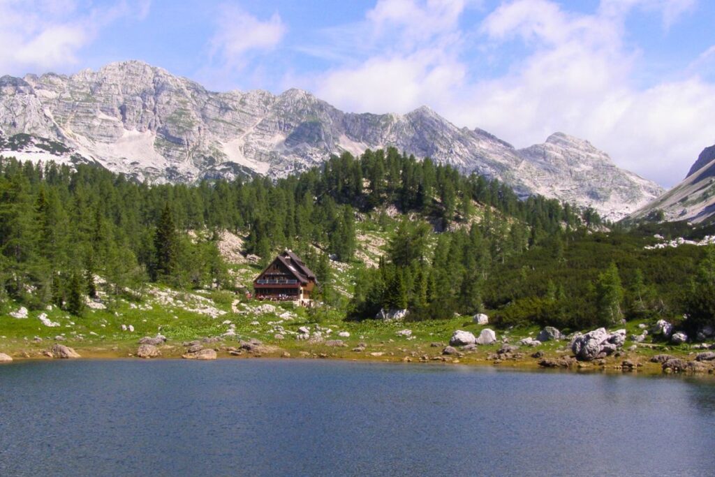 Alpine hut by the lake in Triglav Lakes Valley.