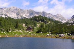 Alpine hut by the lake in Triglav Lakes Valley.