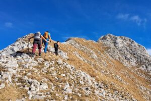 three people hiking